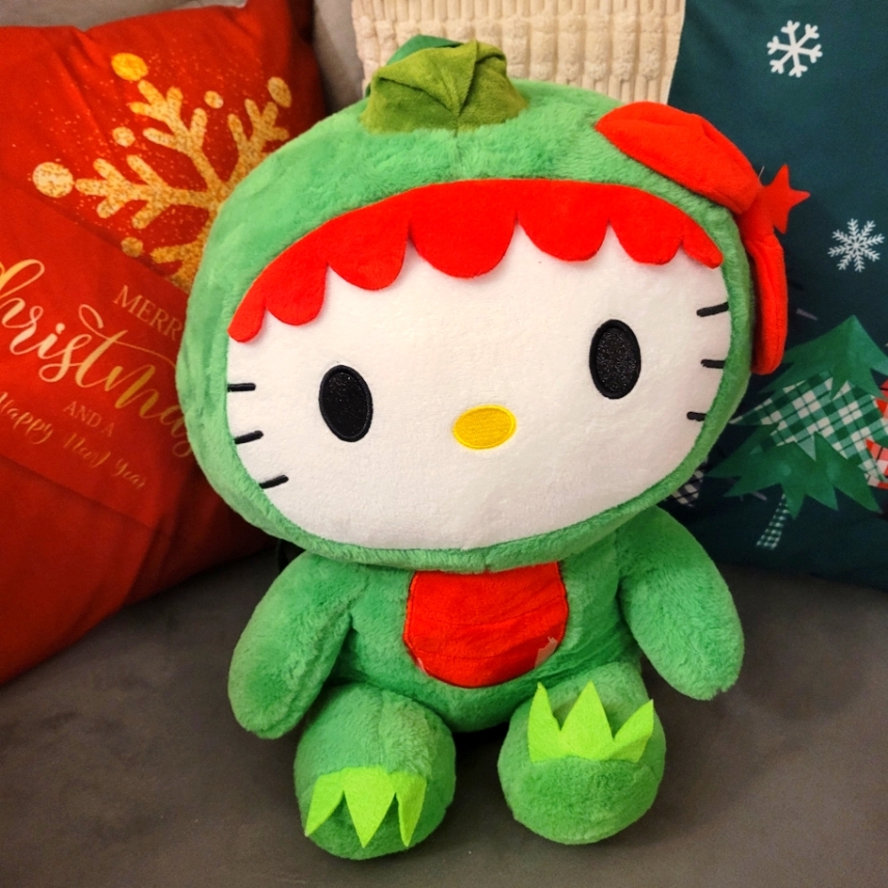17" dinosaur Hello Kitty Backpack, new, no tags.